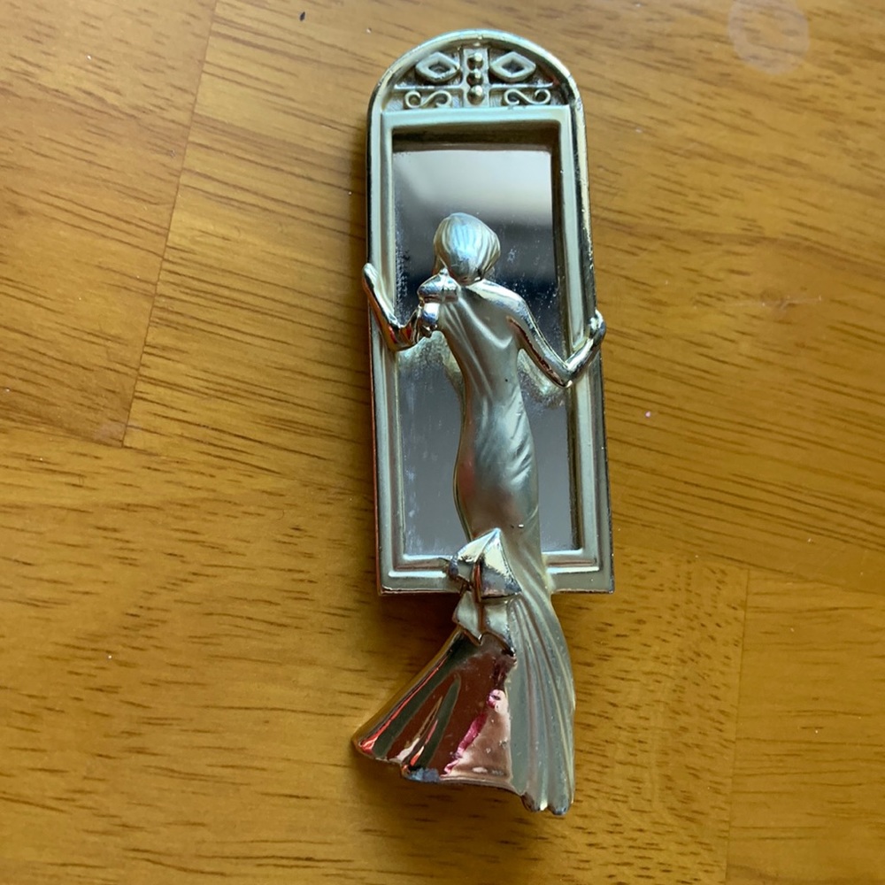 Vintage lady in the mirror pin brooch in gold tone metal by AJC